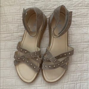 Ankle strap sandals.